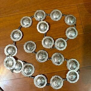 Traditional round southwest stamped concho belt